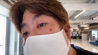 A Man Watches an Airplane at Narita Airport.