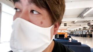 A Man Watches an Airplane at Narita Airport.