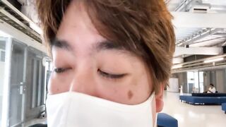 A Man Watches an Airplane at Narita Airport.