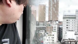 A Man Describing the View from his Hotel in Nippori.