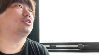 A Man Describing the View from his Hotel in Nippori.