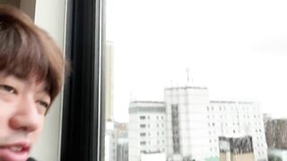 A Man Describing the View from his Hotel in Nippori.