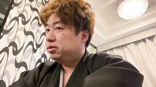 A Man in a Kimono Waiting to be Washed.