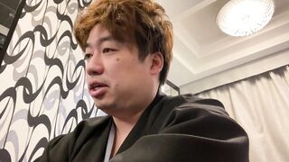 A Man in a Kimono Waiting to be Washed.