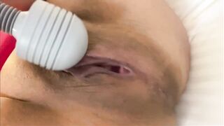A fair and plump Japanese milf leaks with electric masturbation while making a shaved pussy