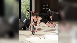 Josie Uses an Ab Wheel in Front of a Mirror (Clothed)